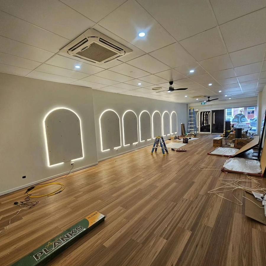 Retail fit-out & lighting — Commercial fit-out · feature lighting — Rising Sun Electrical